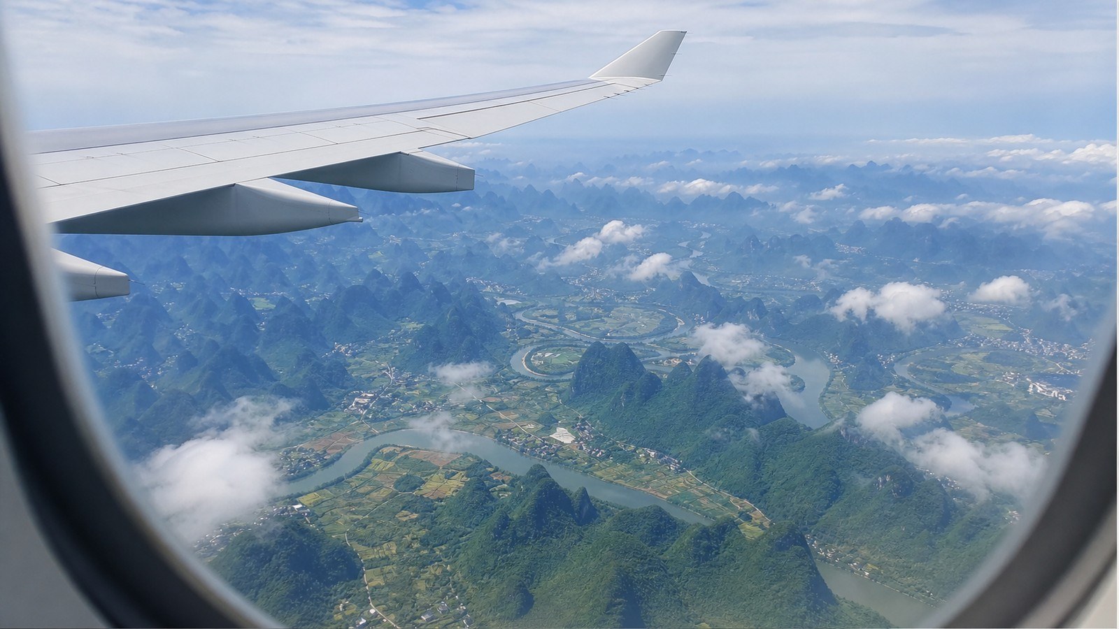Flight from Guilin to Shanghai over karst hills; Yangshuo - Guilin to Shanghai by flight, Day 5 of 13-Day China Group Tour from Chengdu with Classic China Exploration