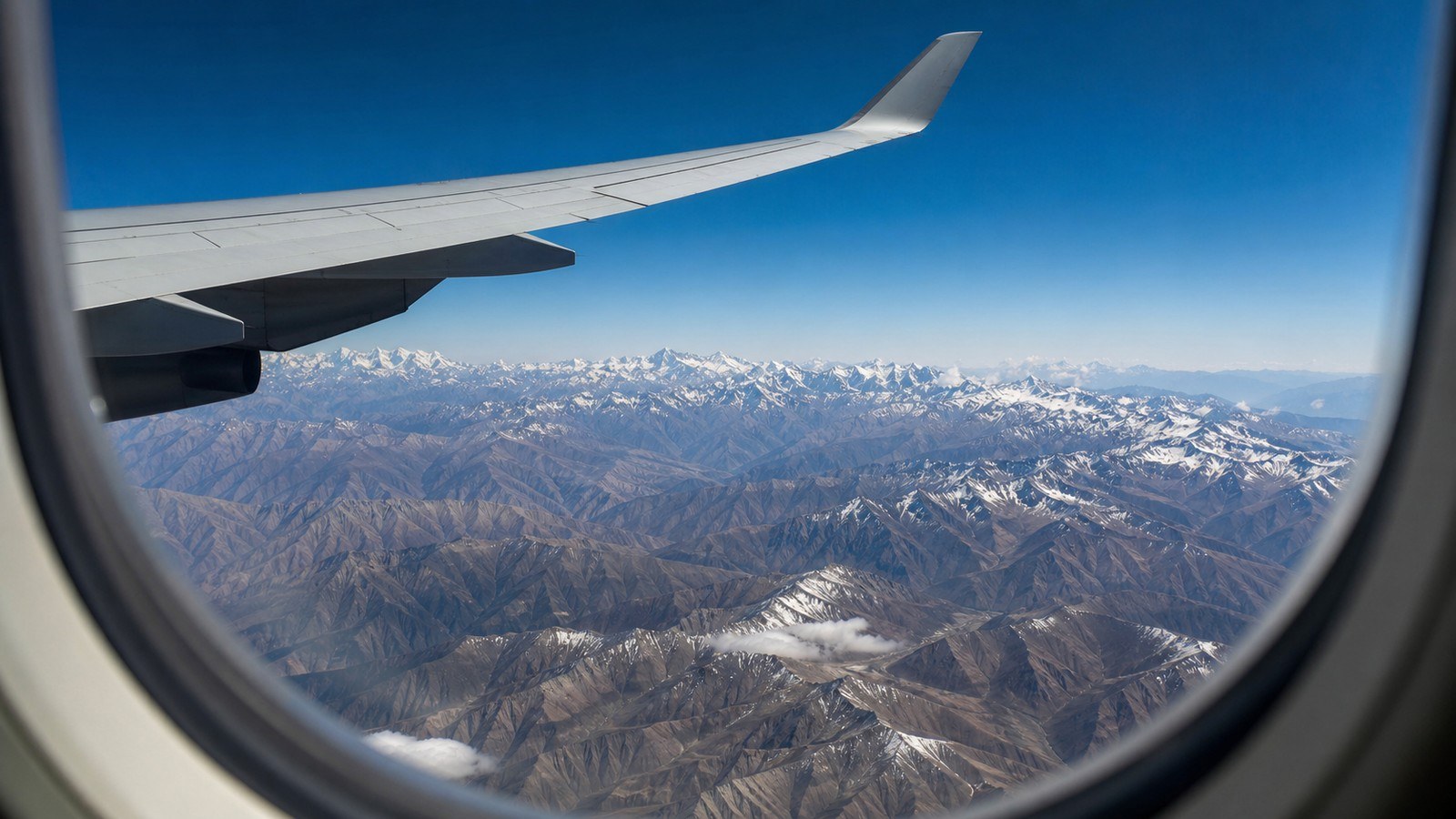 Flight from Shanghai to Lhasa over the Tibetan mountains; Shanghai to Lhasa by Air, Day 3 of 13-Day China Group Tour from Shanghai with Holy Tibet Discovery
