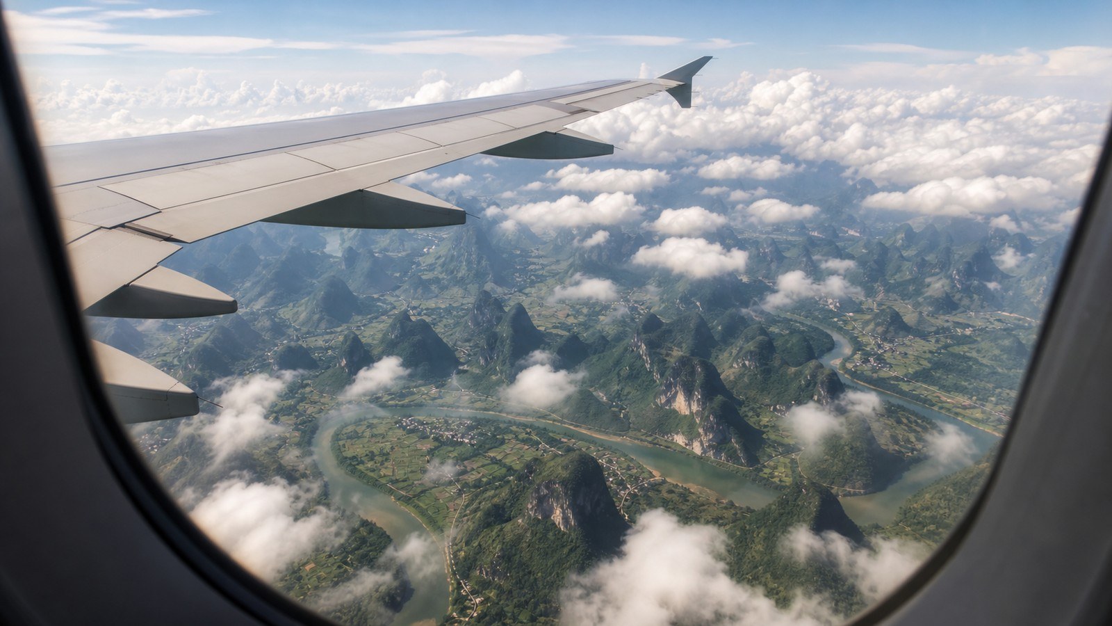 Flight from Shanghai to Guilin over karst hills; Shanghai to Guilin by Flight, Day 3 of 13-Day Shanghai Guilin Yangtze Xi'an Beijing Small Group Tour