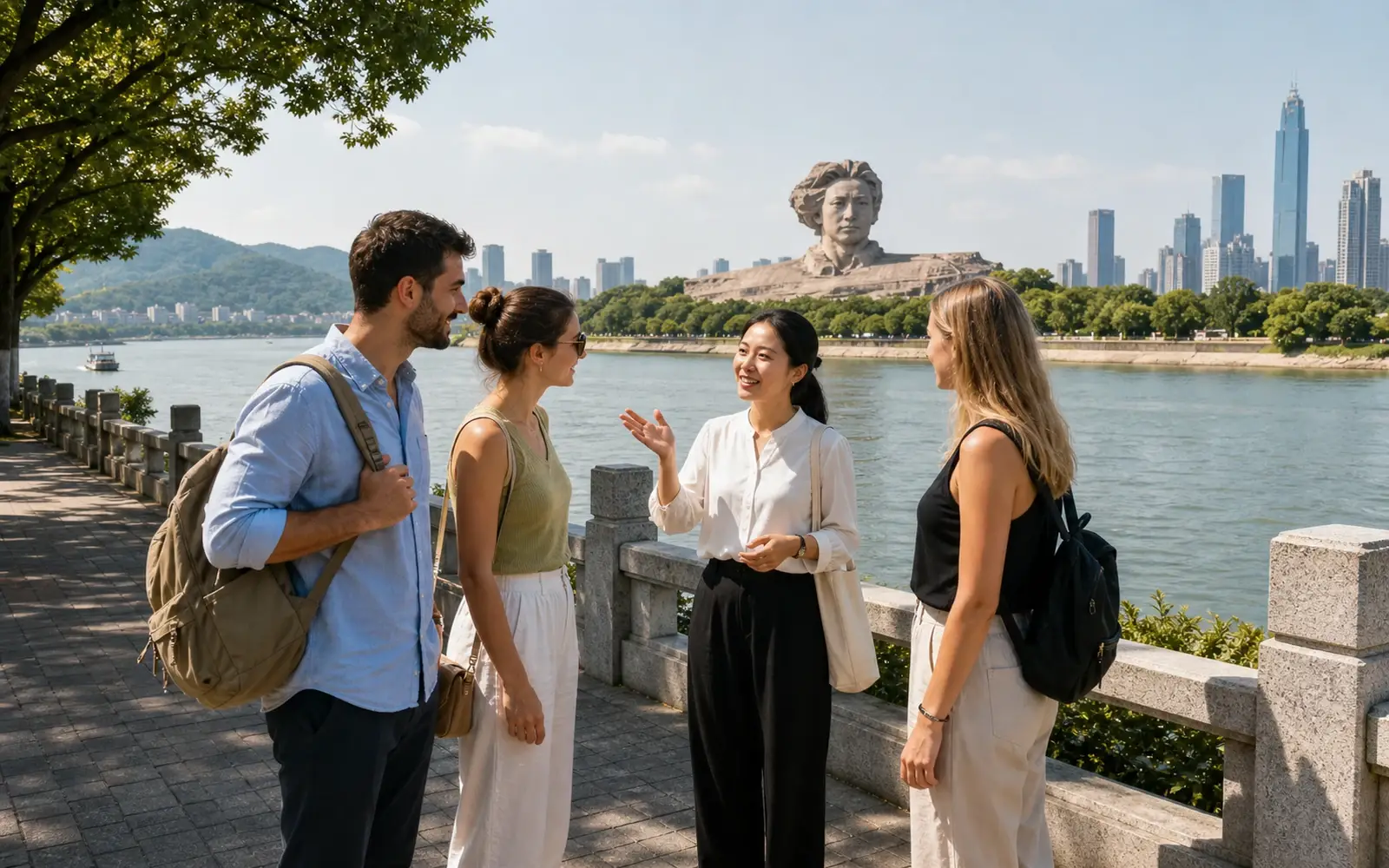 Changsha featuring Orange Isle, the Young Mao public monument, Xiang River, travelers and a local guide