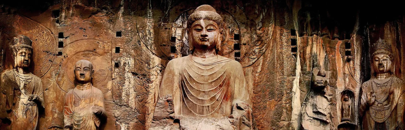 Buddhist cave carvings and riverside cliffs at Longmen Grottoes in Luoyang