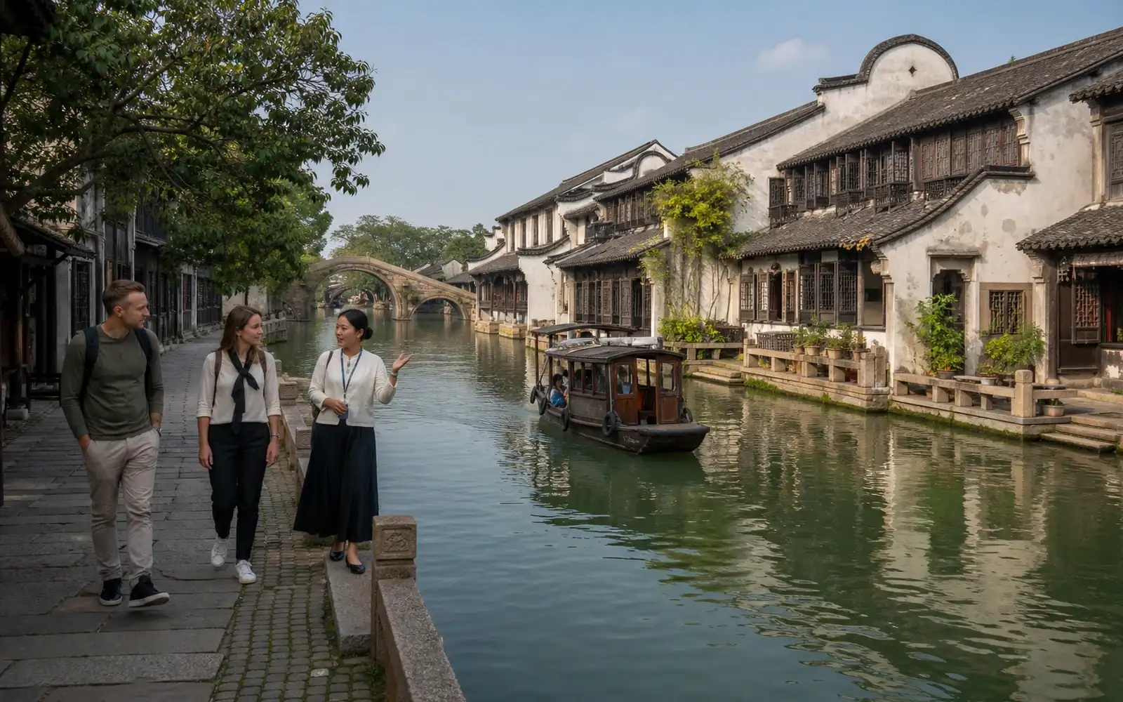 Travelers and a local guide exploring Tongxiang, China, with Wuzhen canals, stone bridges and water-town heritage