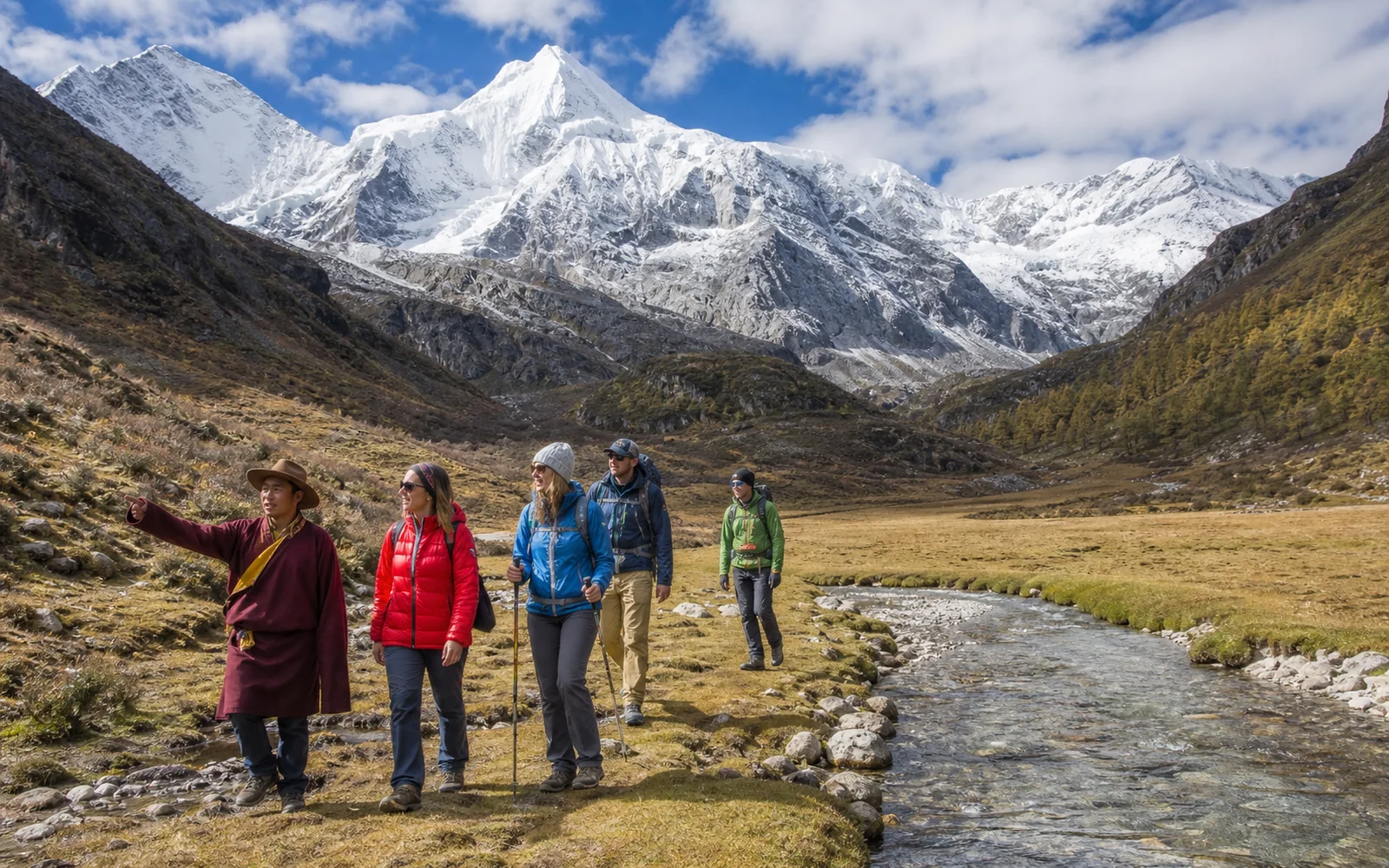 Hikers in the Daocheng Yading mountain landscape