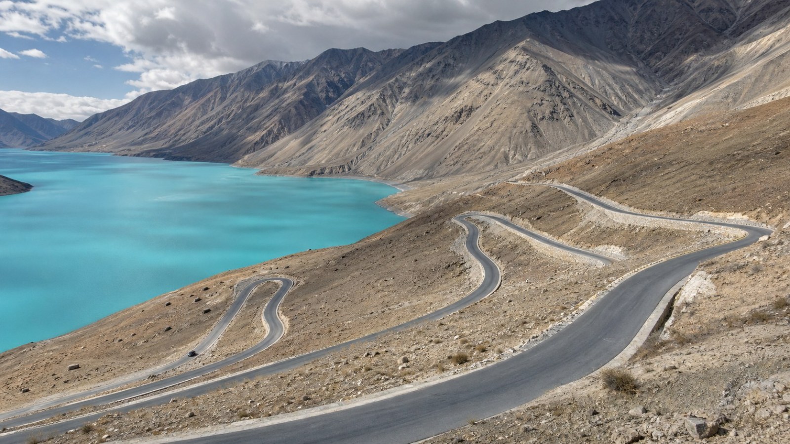Panlong Road switchbacks above turquoise Bandir Blue Lake