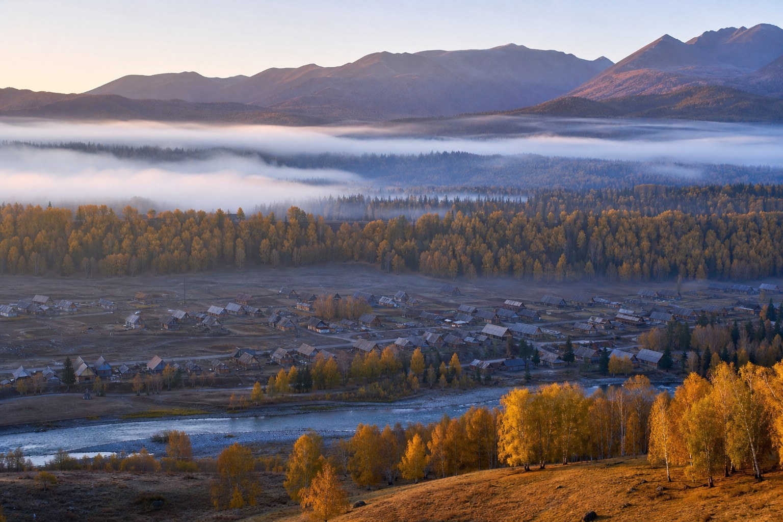Hemu valley, wooden cabins and golden birch woodland at dawn