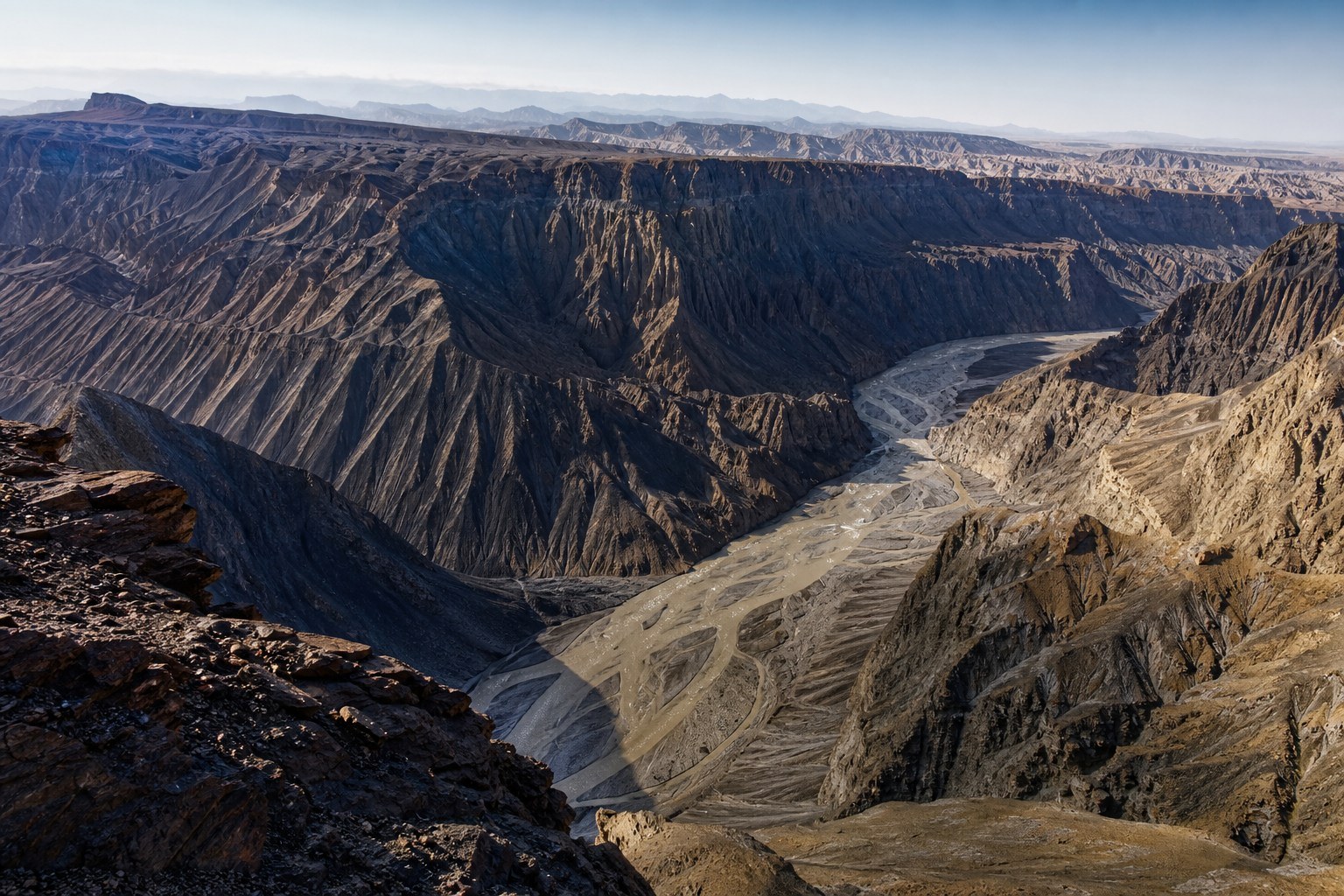 Layered ravines and braided riverbed in Dushanzi Grand Canyon, Xinjiang