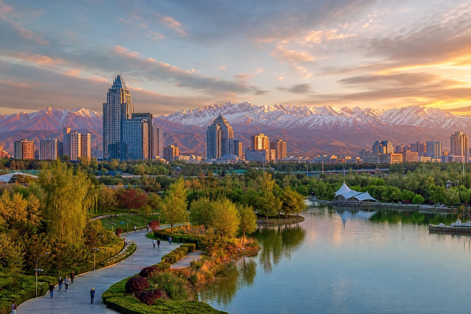 Urumqi city park, landscaped lake and skyline beneath the Tianshan Mountains