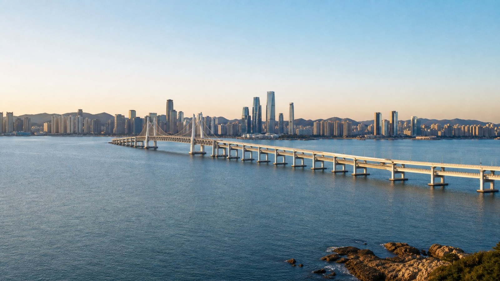 Dalian skyline and Xinghai Bay Bridge at arrival