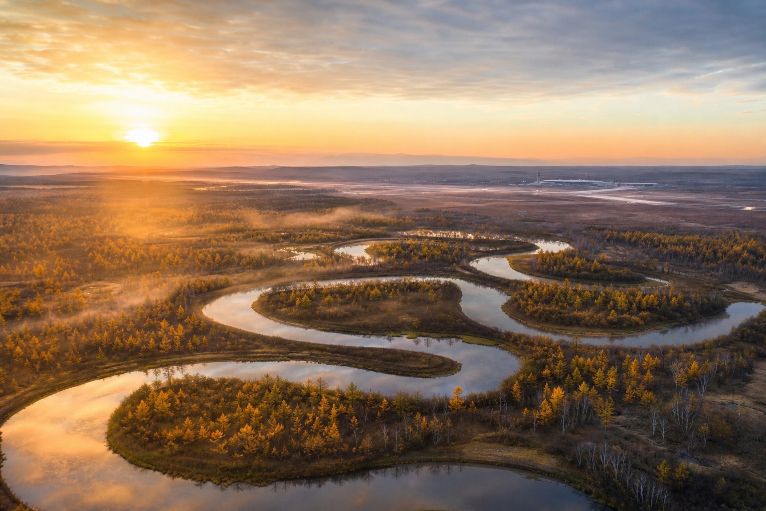 Nine Bends and Eighteen Turns wetland winding through golden forest near Mohe