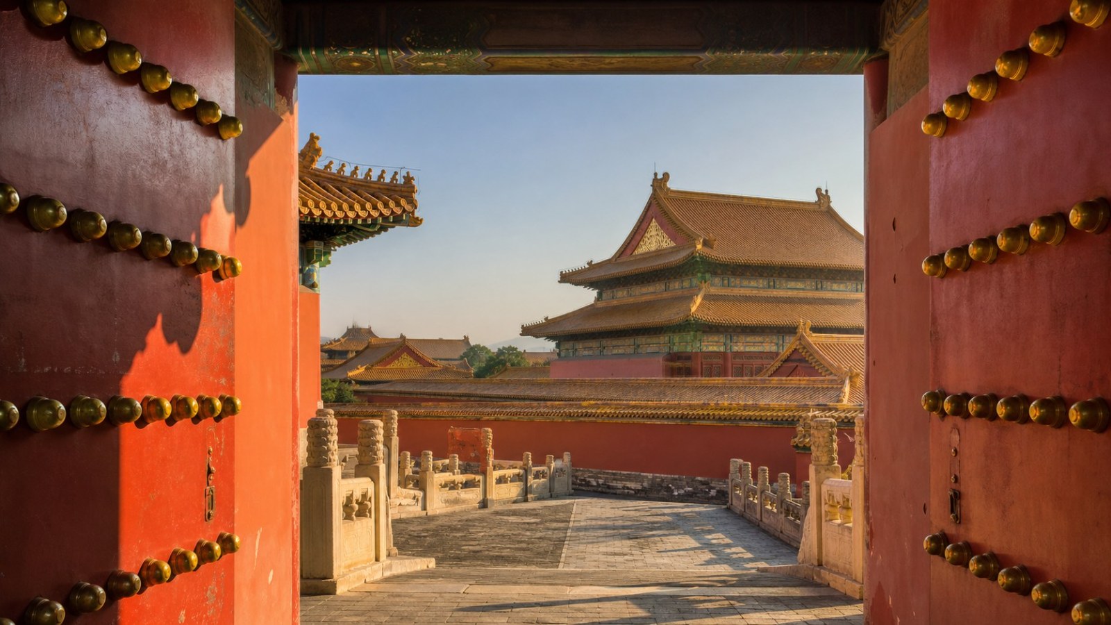 Red gate framing the imperial courtyards of the Forbidden City