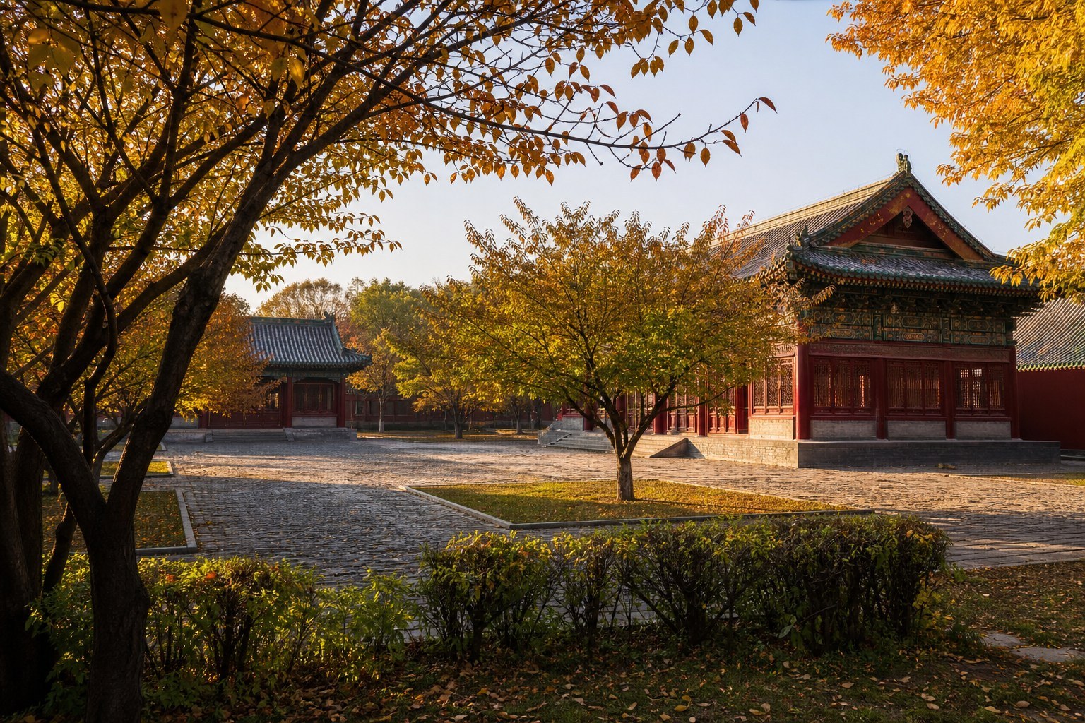 Historic palace courtyard and ornate timber architecture framed by autumn trees in Shenyang