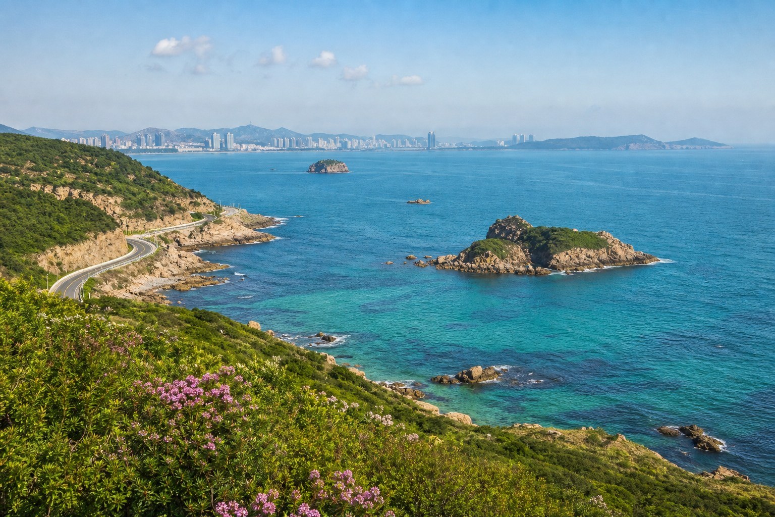 Dalian coastal road, rocky islands and turquoise sea from a clifftop overlook