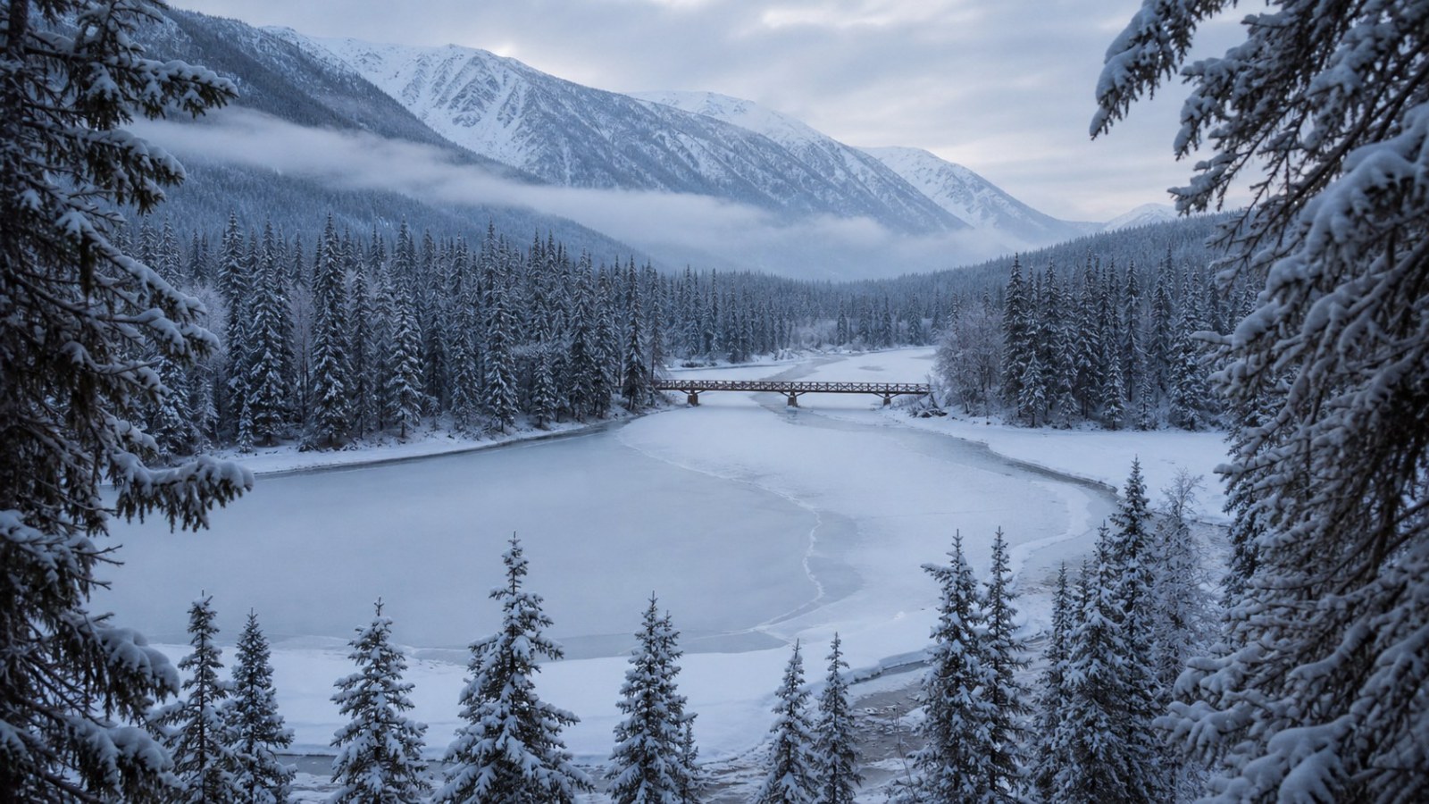 Frozen Kanas river bend, spruce forest and wooden footbridge