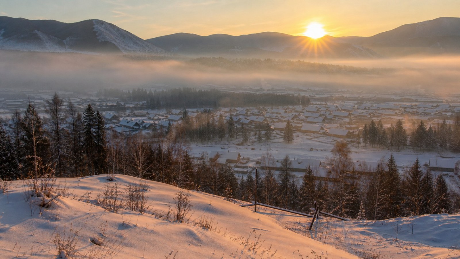 Golden sunrise and morning mist over Hemu village