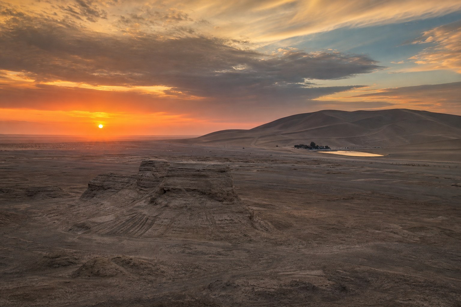 Guazhou Earth sculpture across the Gobi leading toward Mingsha dunes