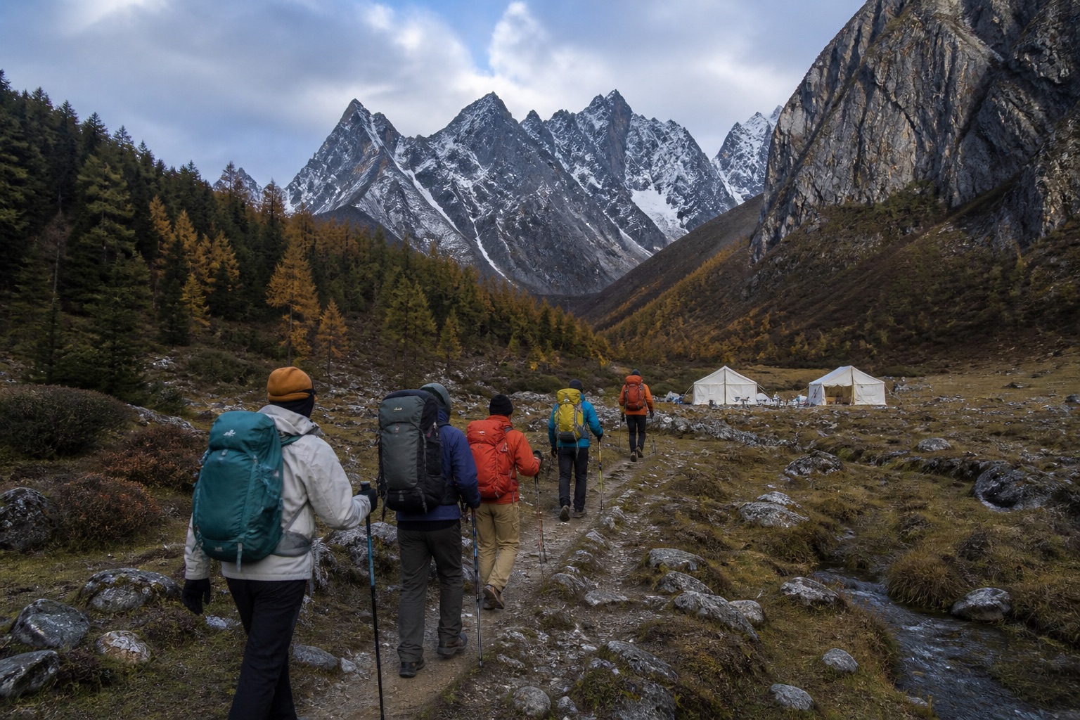 Mount Siguniang hikers reaching a high-altitude base camp in Haizi Valley