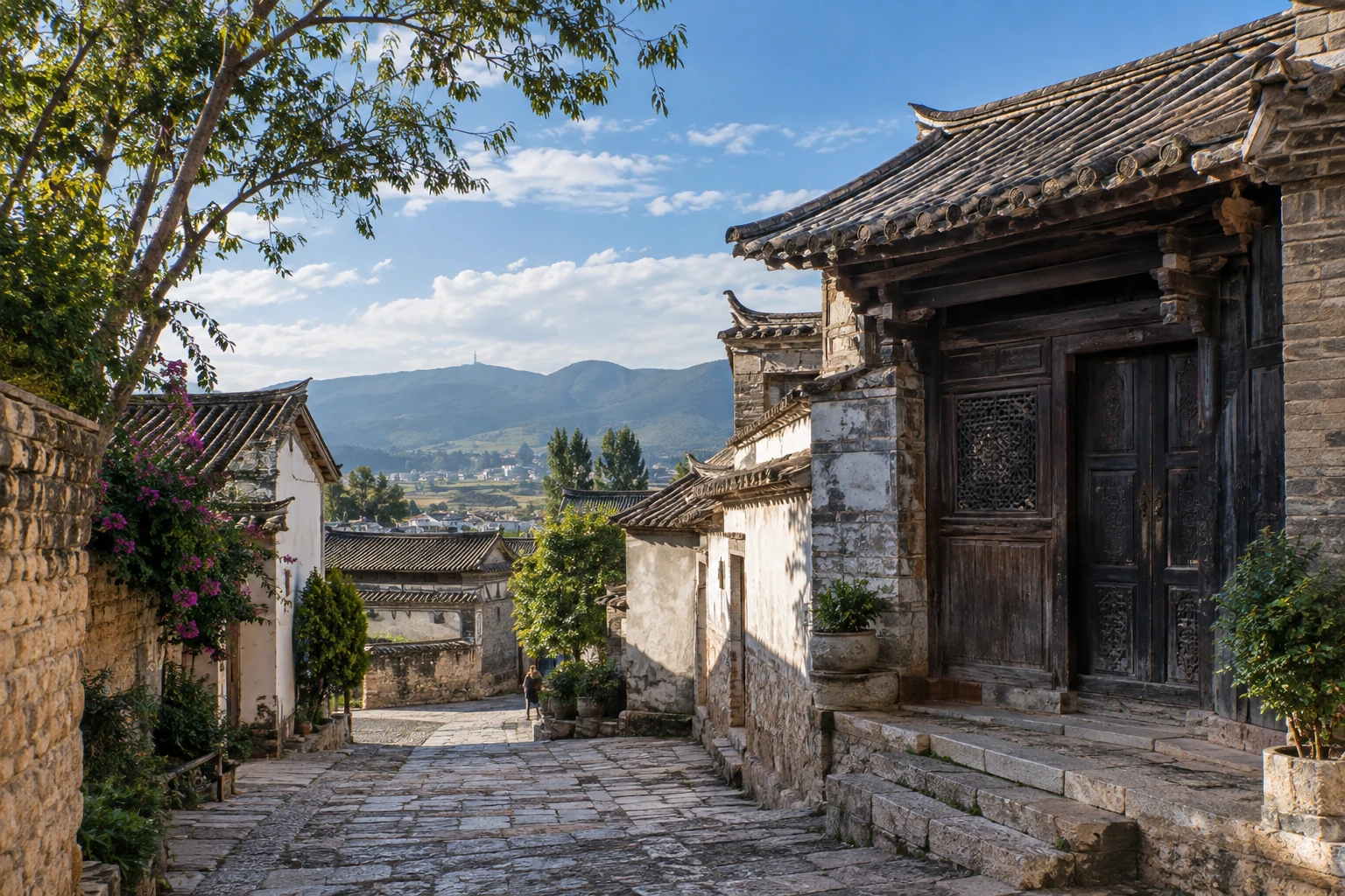 Woodwork and stone paving in a Tuanshan courtyard
