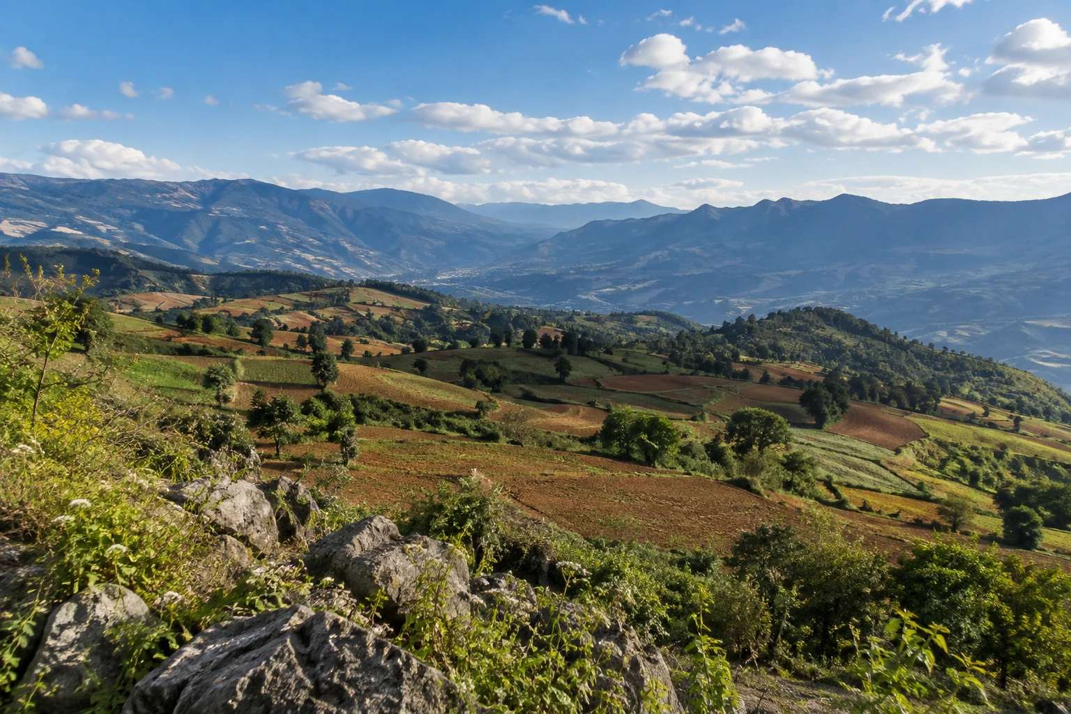 Low hills along the road through Honghe, Yunnan