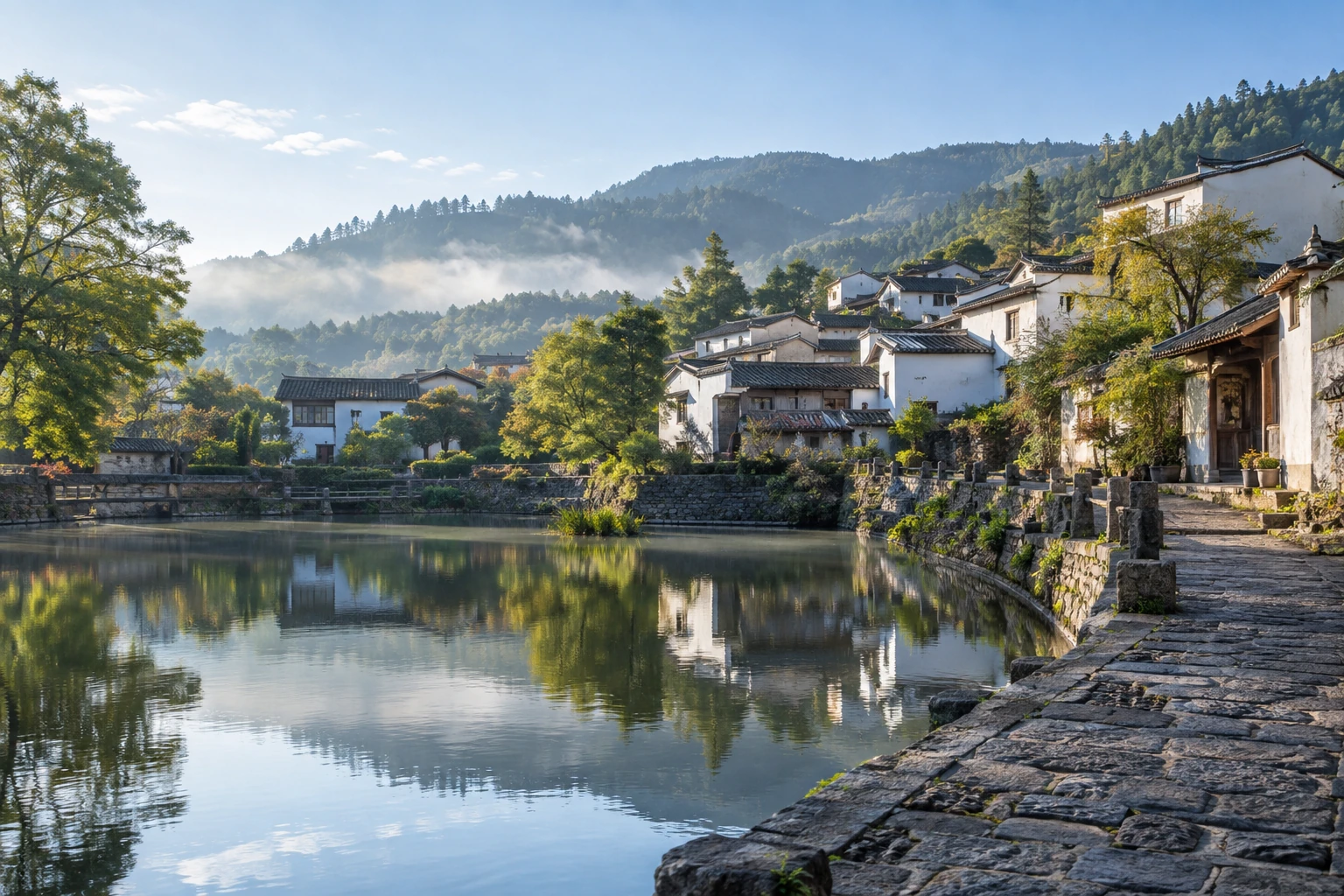 Traditional Heshun houses beside a village pond