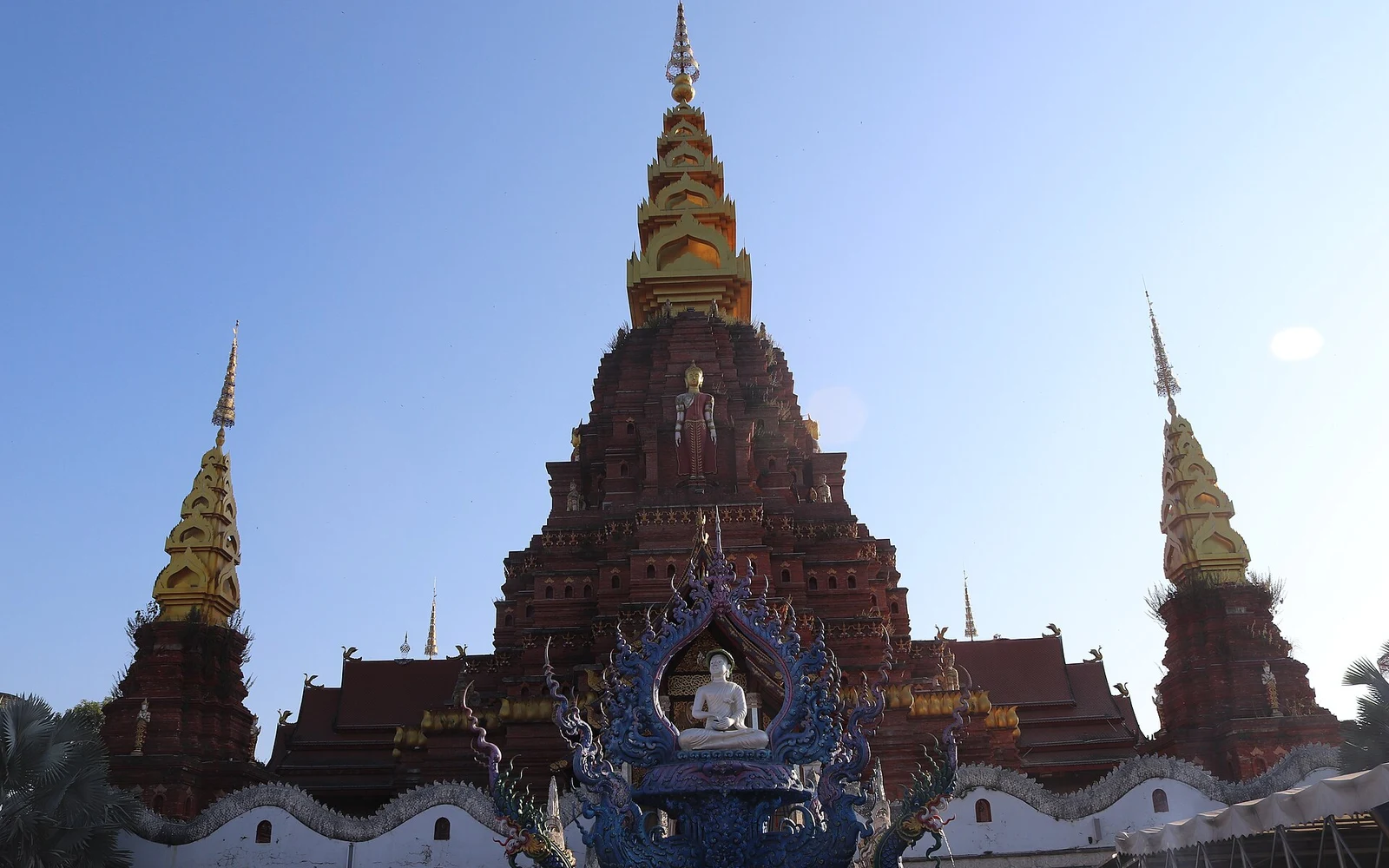 Golden pagoda and temple architecture in Jinghong