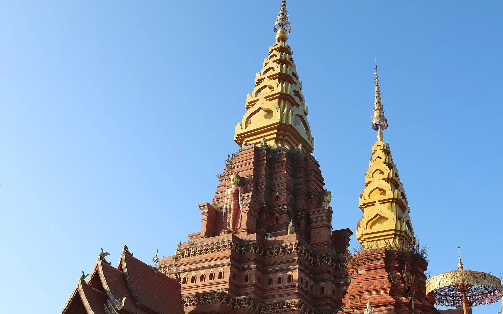 Golden pagoda towers in Jinghong