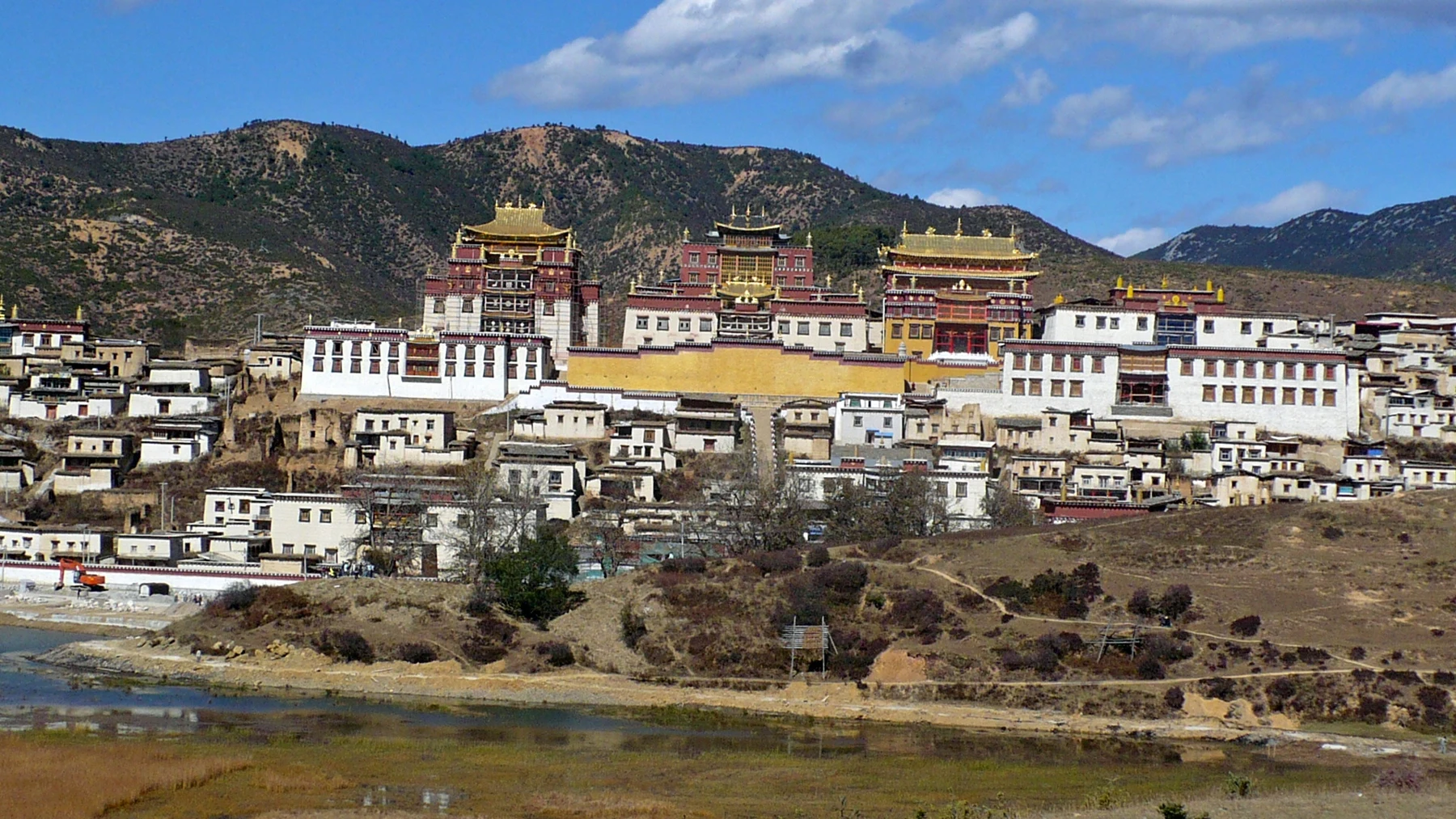 Songzanlin Monastery seen from the lakeside in Shangri-La